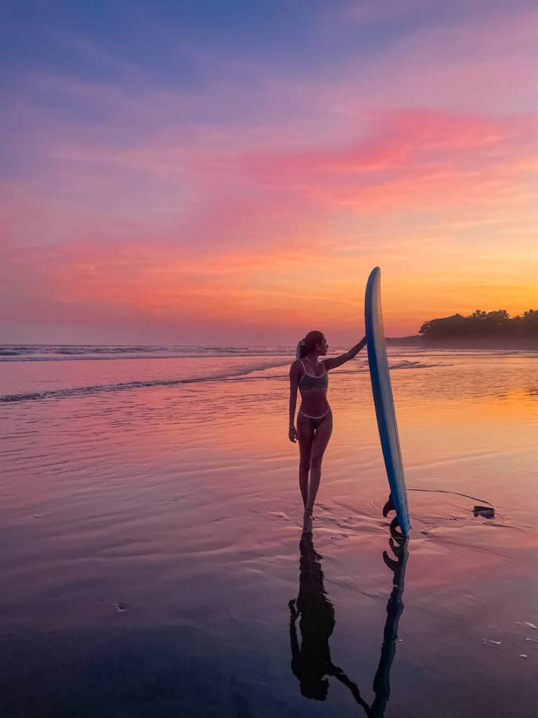 Surfer riding wave on Panama Pacific coast