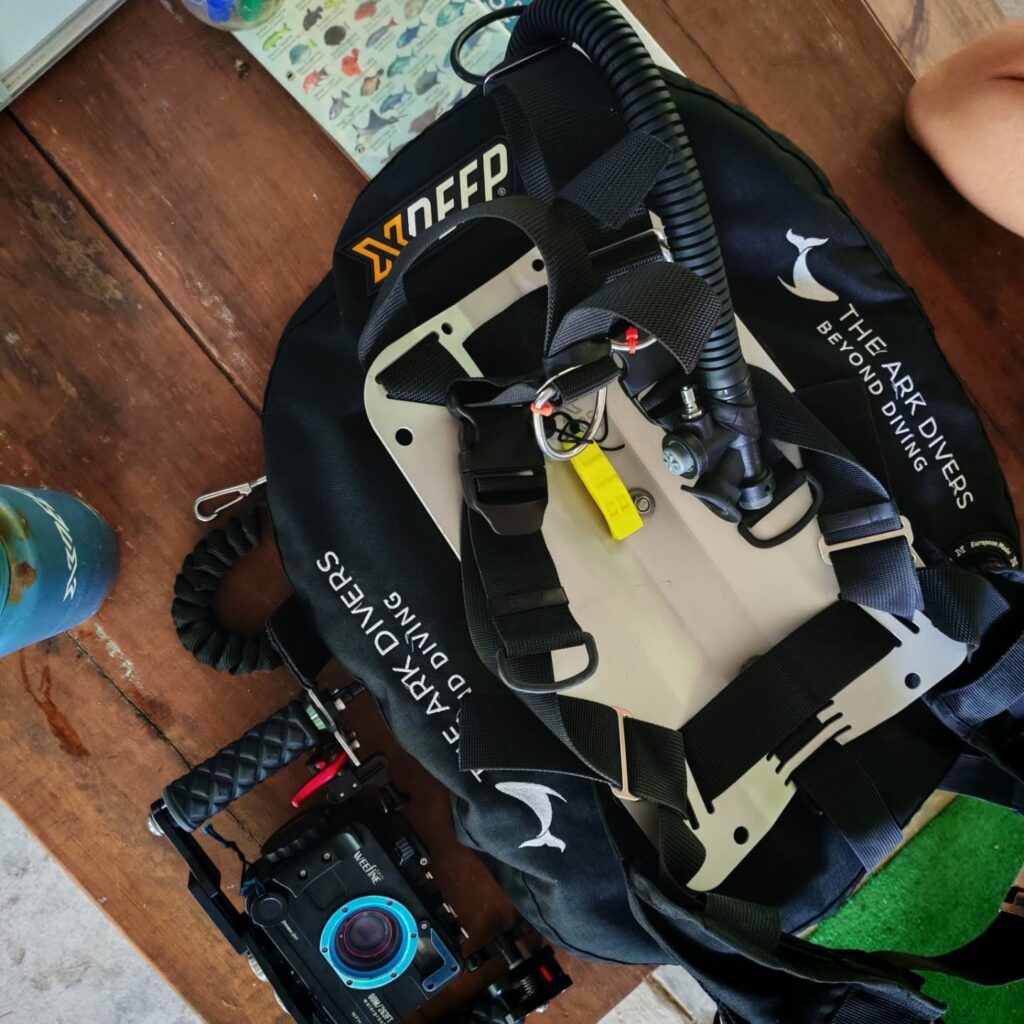 Small boat anchored off tiny Coiba islet