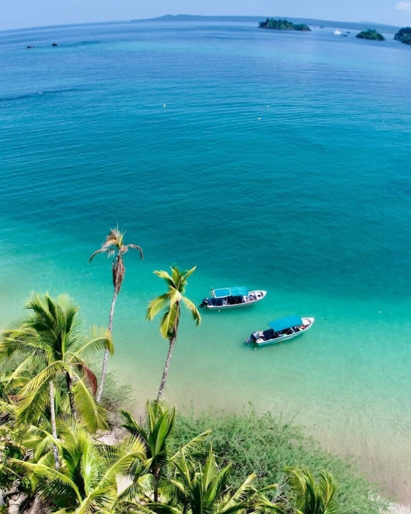 Camera roll of Coiba Island beach and boat photos
