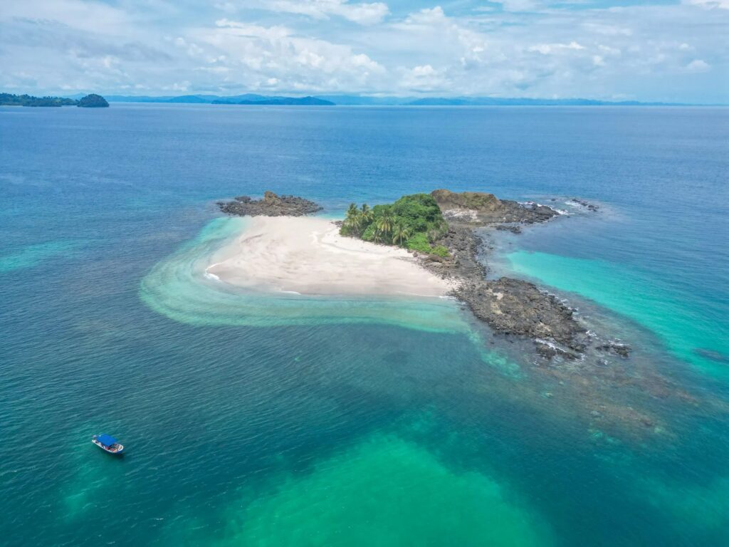 Quiet sandy beach and calm bay near Coiba Island