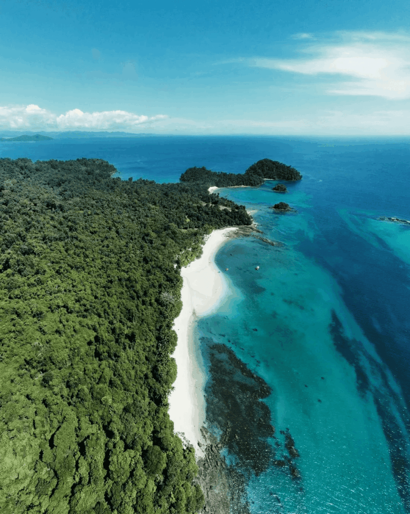 Scuba diver hovering above deep blue water in Coiba