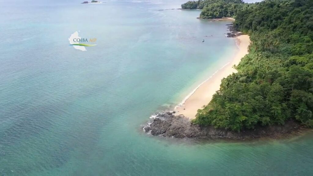 Small tour boat cruising between Coiba islands