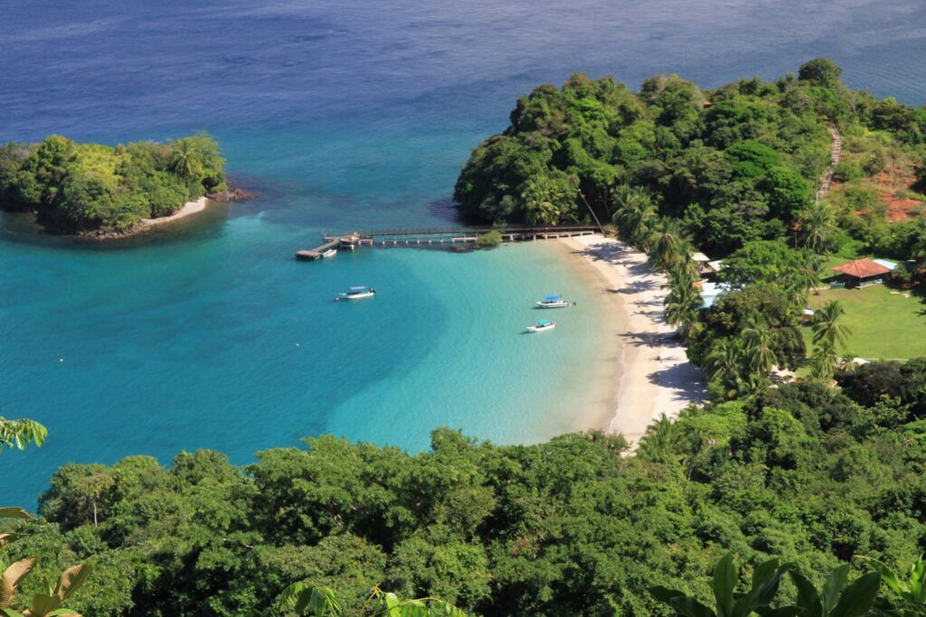 Boat approaching Coiba Island coastline in Panama