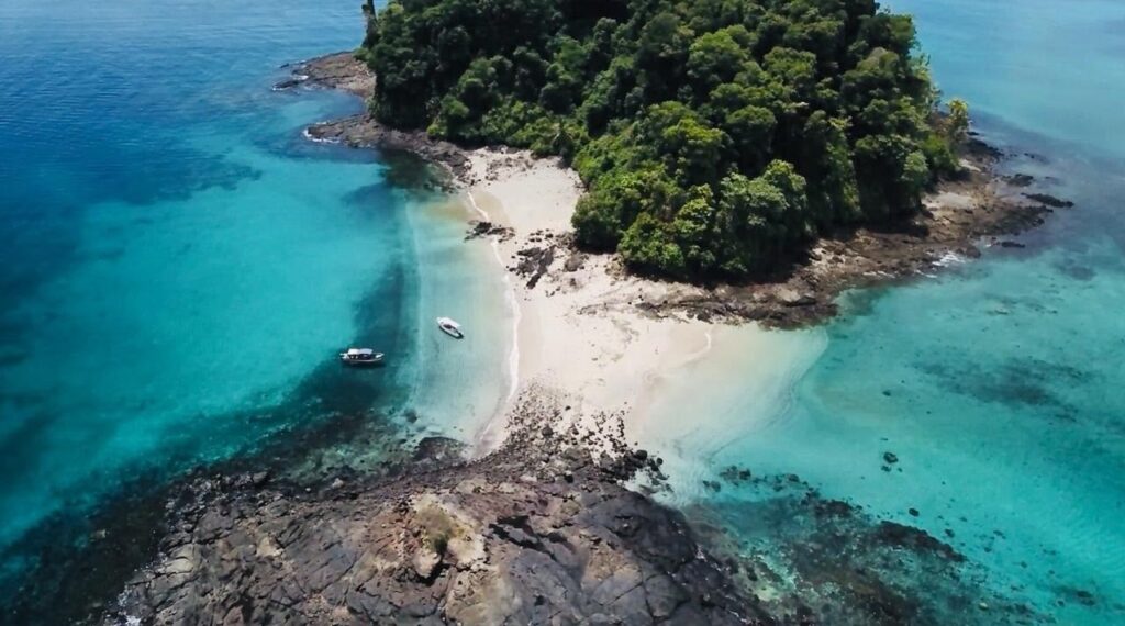 Traveler looking out at Coiba National Park from boat