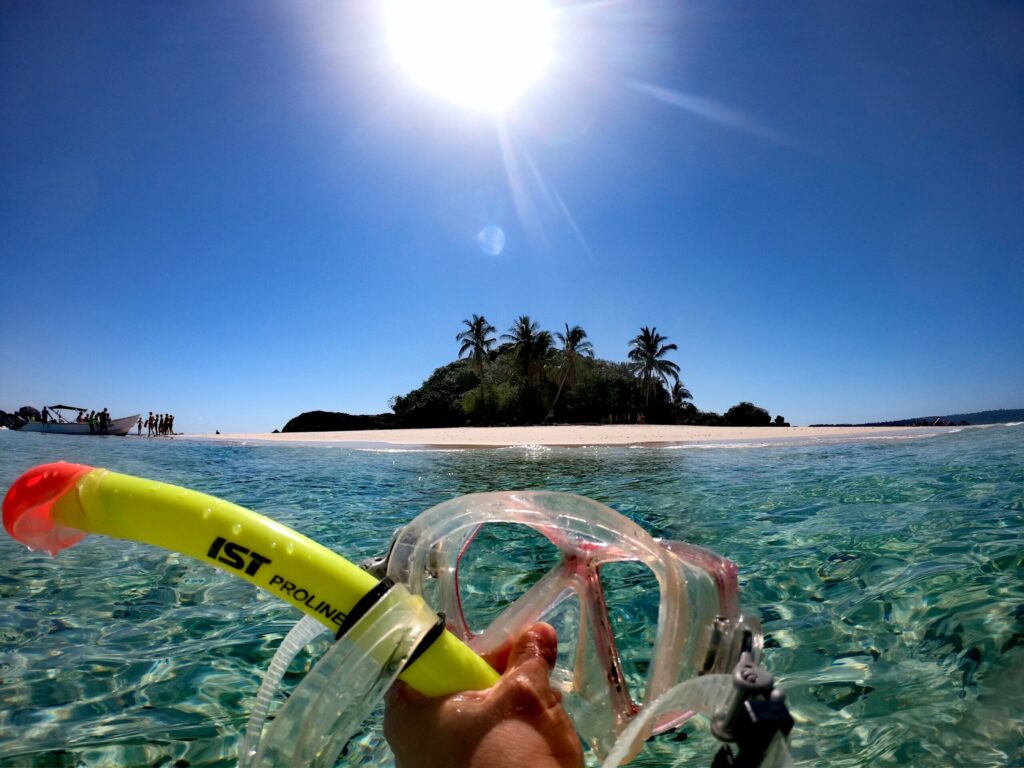 Divers on safety stop above reef in Coiba National Park